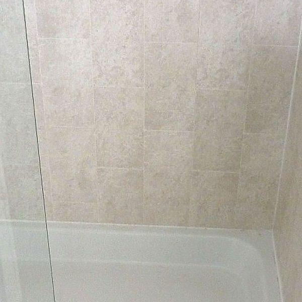 florentine beige tile effect panels in a shower