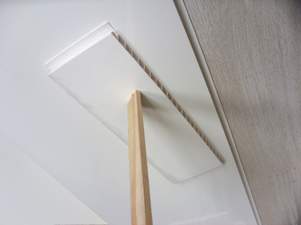 install ceiling panels using props